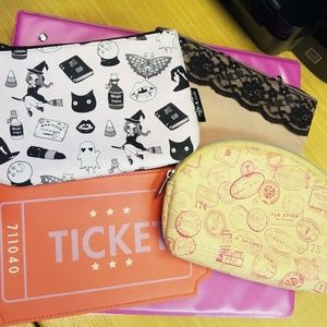 Four Ipsy Cosmetic bags